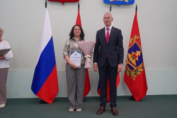 Вручили награды и ключи от четырех квартир нашим тренерам